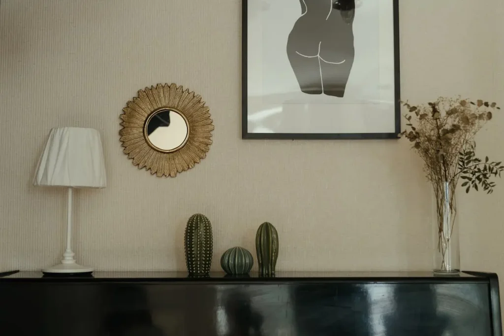 DIY-Friendly Bedroom Decor Ideas Bedroom decor with cactus, wall art, and rustic mirror