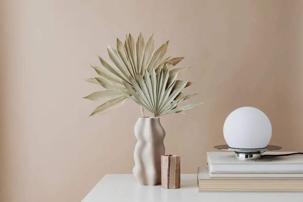 Minimalist Home Decor with Dried Palm Accent Minimalist living room with dried palm arrangement and neutral modern decor