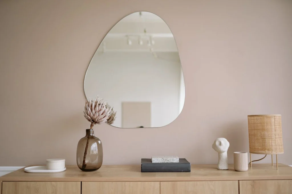 Minimalist Decor Styling Corner Minimalist interior with mirror, vase, and lamp